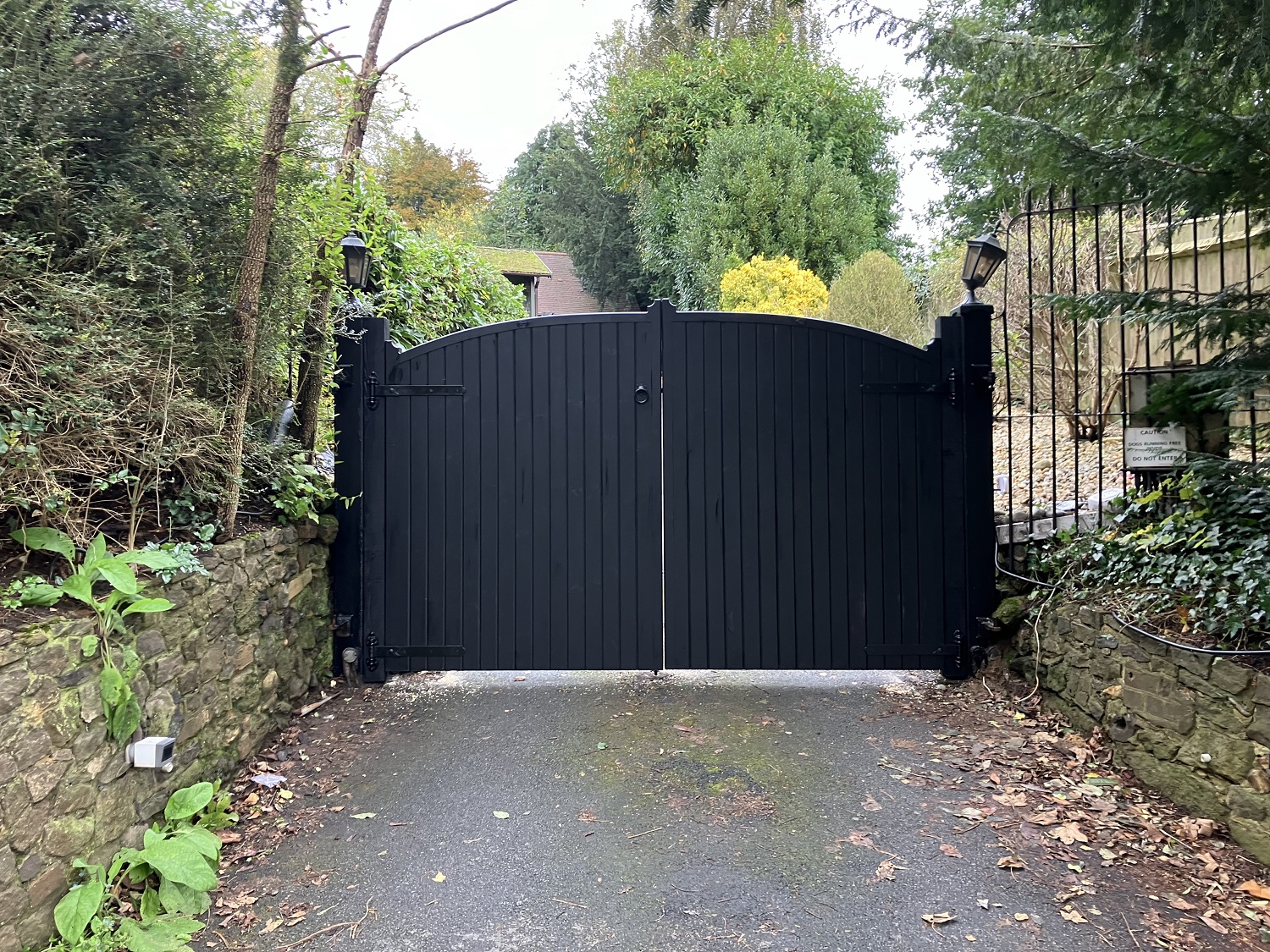 Kent 6ft high wooden estate gates fitted to the front entrance of a driveway